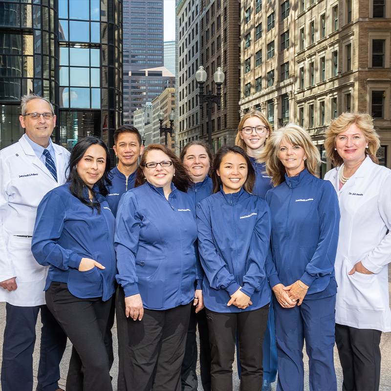 Boston dentists and team standing outside smiling