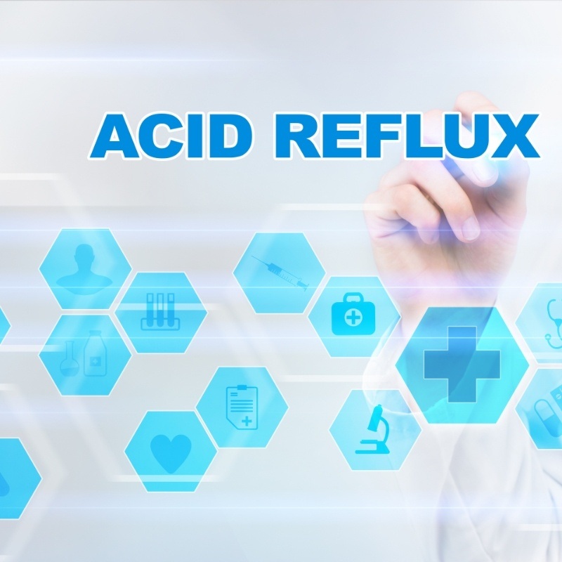 The words acid reflux next to multiple symbols