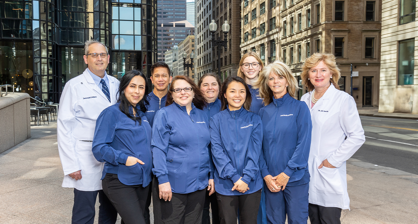 Boston dentists and team outside smiling