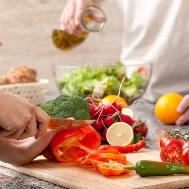 Close up of fruits and vegetables being prepared