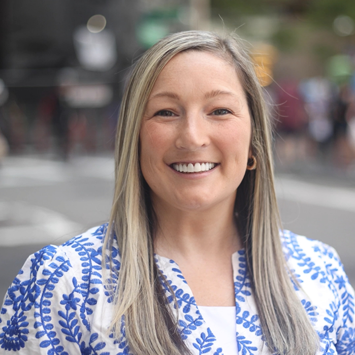 Woman smiling after cosmetic dentistry in Boston