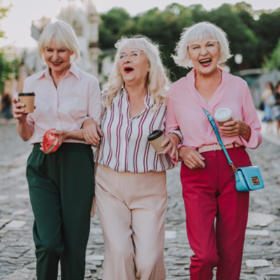Group of senior women laughing on the town