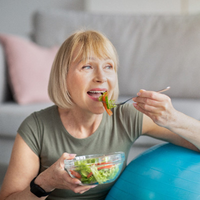 Woman eating a salad