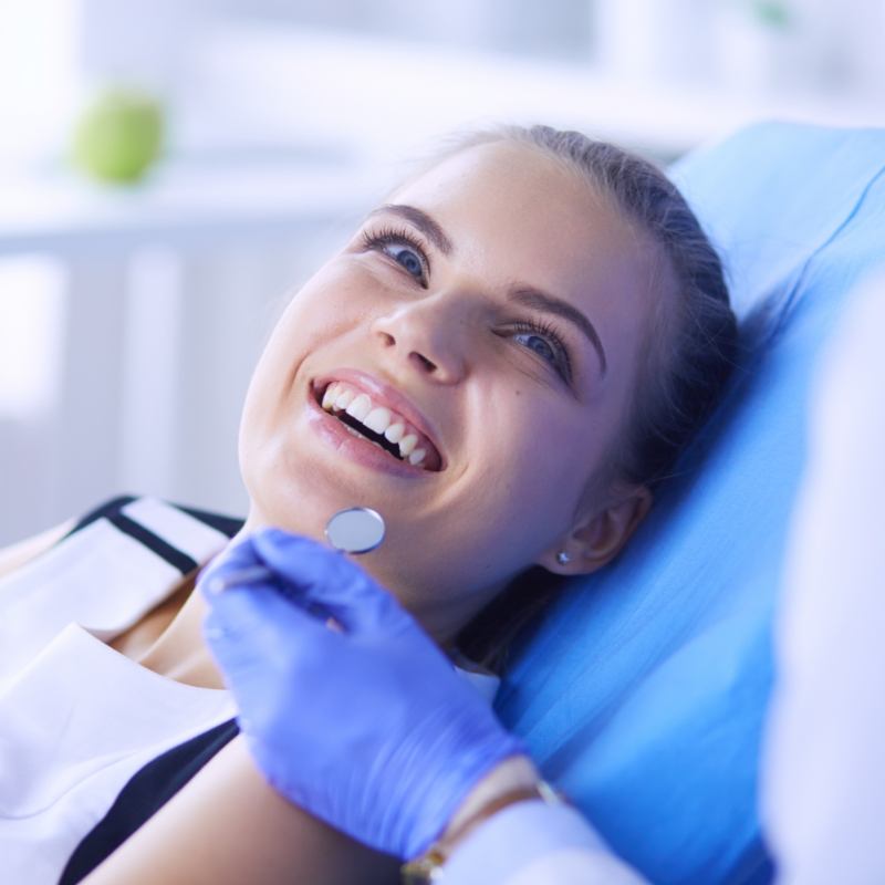 Woman smiling during dental checkup