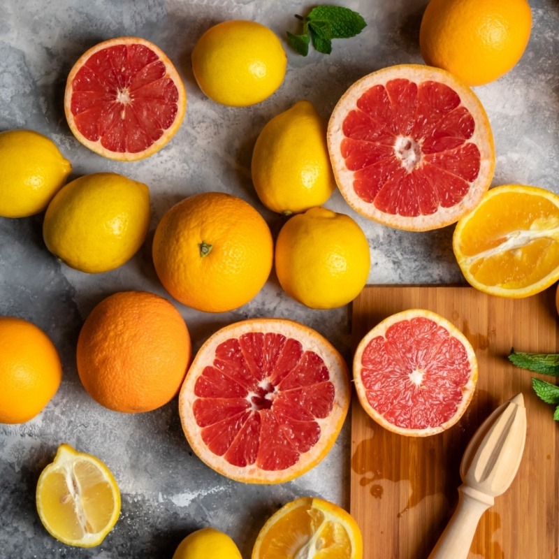 Close up of multiple fruits sliced in half