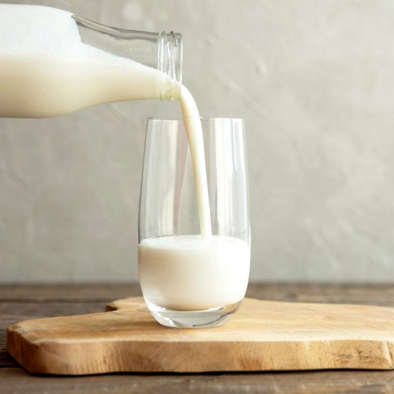 Pouring a glass of milk