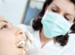 Dentist providing dental care