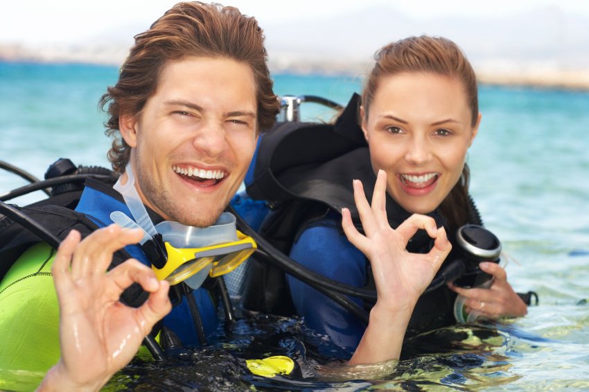 A young couple out scuba diving